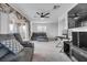 Spacious bonus room with multiple seating areas, perfect for relaxing and entertaining guests at 10664 Sariah Skye Ave, Las Vegas, NV 89166