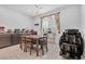 Cozy dining area with table, chairs, and a window for natural light; perfect for casual meals at 10664 Sariah Skye Ave, Las Vegas, NV 89166