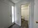 Small white bathroom with a toilet at 4281 White Sands Ave, Las Vegas, NV 89121