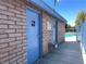 Exterior view of community bathroom building with brick detail at 4281 White Sands Ave, Las Vegas, NV 89121