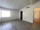 Bedroom with bright walls, modern flooring and a window at 4281 White Sands Ave, Las Vegas, NV 89121