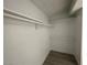 Walk-in closet featuring modern flooring and shelving for storage at 4281 White Sands Ave, Las Vegas, NV 89121
