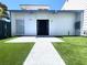 Exterior of a home with artificial grass and a house number at 4281 White Sands Ave, Las Vegas, NV 89121