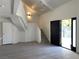 View of open living room, stairs, and black front door at 4281 White Sands Ave, Las Vegas, NV 89121