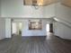 Spacious living room with kitchen view and plenty of natural light at 4281 White Sands Ave, Las Vegas, NV 89121