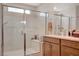 Modern bathroom featuring shower and vanity at 10407 Restless River St, Las Vegas, NV 89141