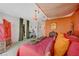 Cozy bedroom featuring colorful decor, walk-in closet, and adjoining bathroom at 10407 Restless River St, Las Vegas, NV 89141