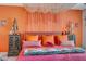 Cozy bedroom features unique decor and colorful accents at 10407 Restless River St, Las Vegas, NV 89141