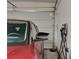 Garage featuring an EV charger, providing convenient charging for electric vehicles at 10407 Restless River St, Las Vegas, NV 89141