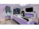 Modern living room showcasing a sleek electric fireplace and stylish decor at 10407 Restless River St, Las Vegas, NV 89141