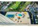 Luxury condo complex featuring a swimming pool, tennis court, putting green, and well-manicured landscaping at 3111 Bel Air Dr # 28C, Las Vegas, NV 89109