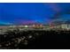 Striking city view featuring the Las Vegas skyline with a colorful sunset at 3111 Bel Air Dr # 28C, Las Vegas, NV 89109