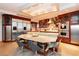Well-appointed kitchen featuring stainless steel appliances, a center island, and custom cabinetry for ample storage at 3111 Bel Air Dr # 28C, Las Vegas, NV 89109