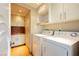 Functional laundry room with modern appliances, ample cabinet space, and efficient design at 3111 Bel Air Dr # 28C, Las Vegas, NV 89109