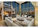 Bright living room with floor-to-ceiling windows and city views, offering a stylish and modern design at 3111 Bel Air Dr # 28C, Las Vegas, NV 89109