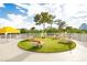 Outdoor lounge area with comfortable chairs situated on a well-manicured lawn at 3111 Bel Air Dr # 28C, Las Vegas, NV 89109