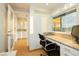 Bright office features granite countertops, built-in storage and a window overlooking the cityscape at 3111 Bel Air Dr # 28C, Las Vegas, NV 89109