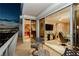 Expansive patio with city views, featuring comfortable seating and access to indoor living spaces at 3111 Bel Air Dr # 28C, Las Vegas, NV 89109