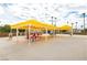 Outdoor dining patio area featuring shade structures with tables and chairs at 3111 Bel Air Dr # 28C, Las Vegas, NV 89109