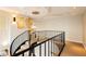 Elegant staircase featuring wrought iron railings and recessed lighting fixtures, offering an open, inviting feel at 3111 Bel Air Dr # 28C, Las Vegas, NV 89109