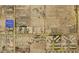 Aerial view of a parcel of land, showing proximity to the grid, roads, and other homes at 1130 N Leslie St, Pahrump, NV 89060
