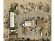 Expansive aerial view of a commercial lot featuring multiple buildings and ample parking space at 1130 N Leslie St, Pahrump, NV 89060