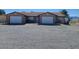 A well-maintained single-Gathering home with a gravel yard and a two car garage at 1130 N Leslie St, Pahrump, NV 89060