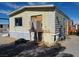 Exterior of a manufactured home with siding and a porch area at 1130 N Leslie St, Pahrump, NV 89060