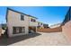 View of the backyard featuring a blank canvas awaiting landscaping design with newly constructed home at 98 Via Franello, Henderson, NV 89011