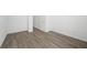 An empty room with tile flooring features neutral paint and a door to another room at 98 Via Franello, Henderson, NV 89011