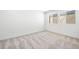 Bedroom featuring neutral carpet, white walls, and natural light at 98 Via Franello, Henderson, NV 89011