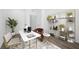 Stylish home office featuring a modern desk, shelving, and decor with plants at 98 Via Franello, Henderson, NV 89011