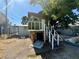 Backyard featuring an elevated playhouse with staircase at 3895 Mountain Trl, Las Vegas, NV 89108