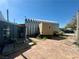 A backyard featuring a metal structure and shed provides ample outdoor storage space at 3895 Mountain Trl, Las Vegas, NV 89108