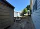 Backyard featuring a fire pit and shed with ample space for outdoor activities at 3895 Mountain Trl, Las Vegas, NV 89108