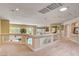 Shows an upper-level hallway with glass railings overlooking a pool and a spacious layout at 4156 Balmoral Castle Ct, Las Vegas, NV 89141