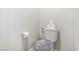 Simple bathroom with toilet and a small vanity at 8351 Gold River Ct, Las Vegas, NV 89113