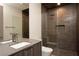 Modern bathroom features a glass shower and sleek vanity at 12 Chisel Crest Ct, Henderson, NV 89012