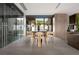 Modern dining area with contemporary table set and adjacent wine storage at 12 Chisel Crest Ct, Henderson, NV 89012