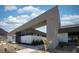 Modern home showcasing minimalist architecture, desert landscaping, and a unique cantilevered design at 12 Chisel Crest Ct, Henderson, NV 89012