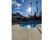 Inviting kidney-shaped pool with spa in a sunny backyard at 2802 Camelback Ln, Henderson, NV 89074