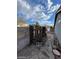 Backyard with flagstone patio and wooden fence at 2802 Camelback Ln, Henderson, NV 89074