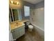 Clean bathroom with bathtub, toilet, and vanity at 2802 Camelback Ln, Henderson, NV 89074