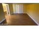 Bright bedroom with hardwood floors and access to bathroom at 2802 Camelback Ln, Henderson, NV 89074