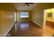 Bedroom with hardwood floors, ceiling fan and bathroom access at 2802 Camelback Ln, Henderson, NV 89074