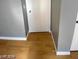 Hardwood floor bedroom with gray walls and a closet at 2802 Camelback Ln, Henderson, NV 89074