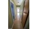 Bright hallway with hardwood floors and built in storage at 2802 Camelback Ln, Henderson, NV 89074