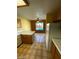 Kitchen with pool view, wood cabinets, and tile floors at 2802 Camelback Ln, Henderson, NV 89074