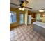 Bright kitchen with wood cabinets, tiled floor, and island at 2802 Camelback Ln, Henderson, NV 89074