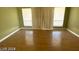 Living room with hardwood floors and large windows at 2802 Camelback Ln, Henderson, NV 89074